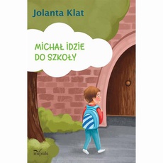 The cover of the book titled: Michał idzie do szkoły. Opowiadania z propozycjami zabaw przygotowujących do czytania i pisania
