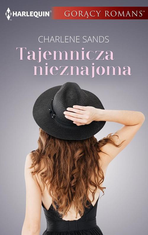 Обложка книги под заглавием:Tajemnicza nieznajoma