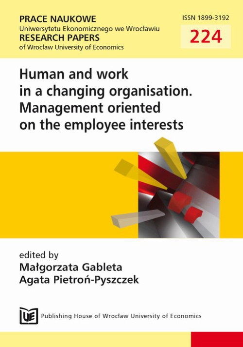 The cover of the book titled: Human and work in a changing organisation.Management oriented on the employee interests